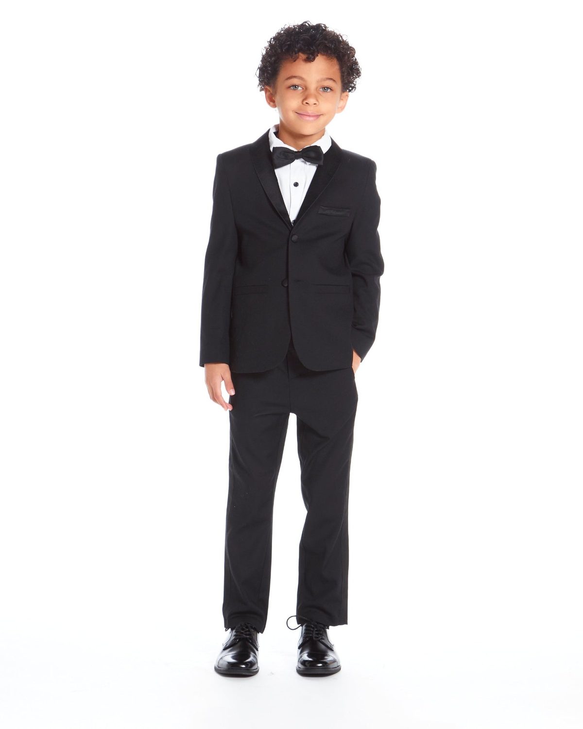 Boy in an Isaac Mizrahi black tuxedo
