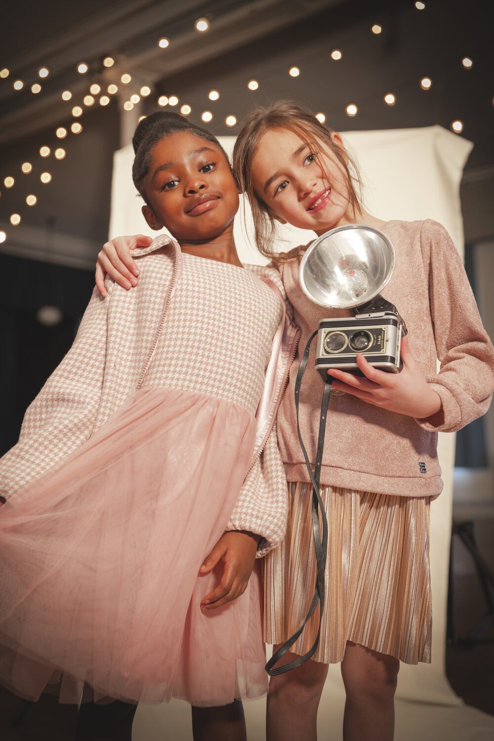 Two girls in Deux par Deux pink dresses