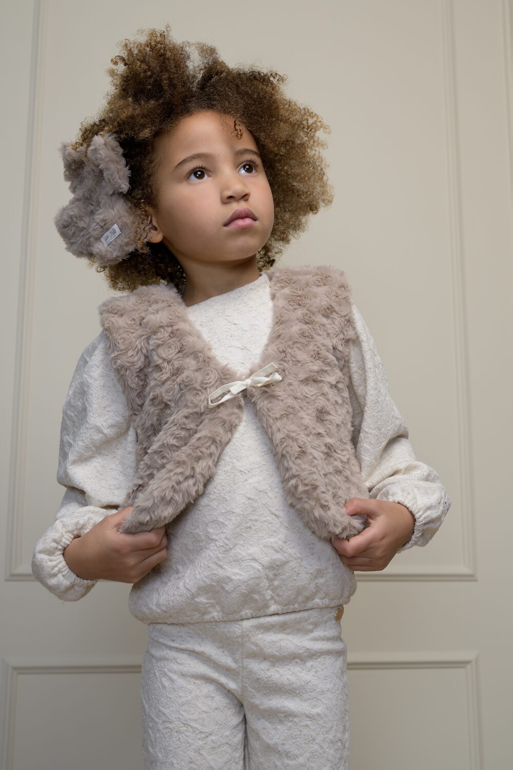 Girl in a Le Chic fur gilet