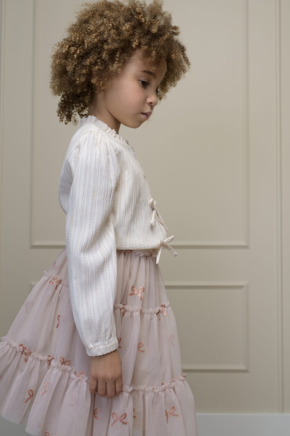 Girl in a Le Chic pink tulle skirt