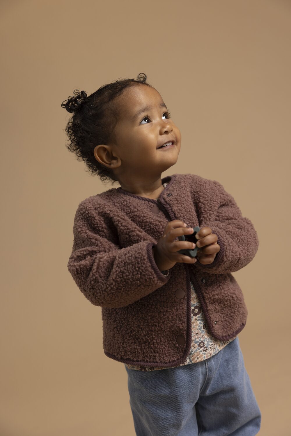 Toddler in a Noppies teddy jacket